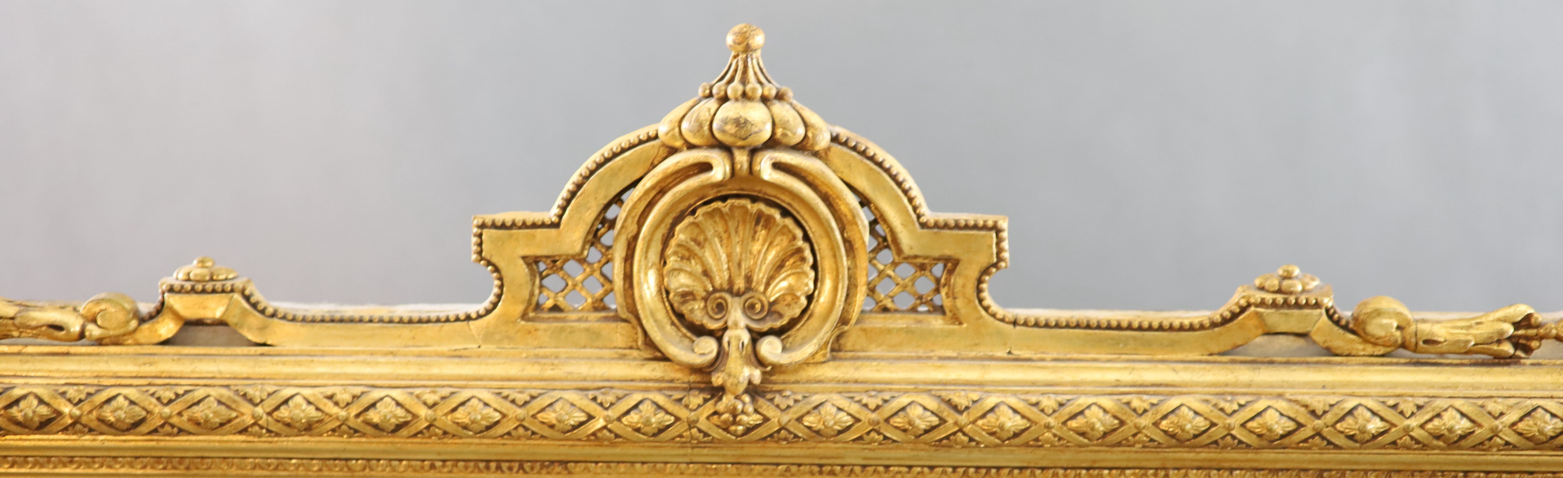 A Victorian gilt gesso overmantel W. 4ft. 6in. H.4ft. 10in.